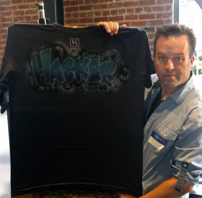 Airbrush tee shirt at corporate event